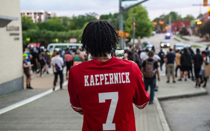Colin Kaepernick Calls for Abolishing Police