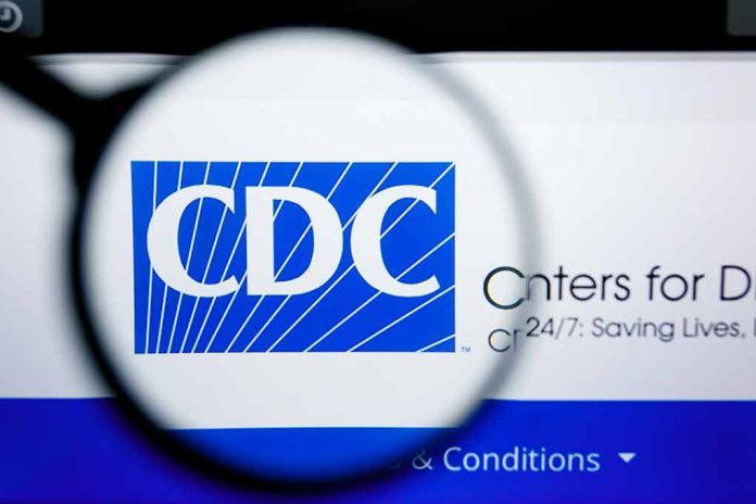 CDC logo magnified on a screen.