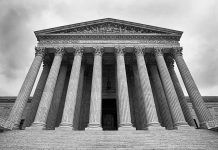 SCOTUS building with large columns and stairs.