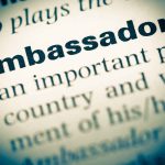 Ambassador dictionary definition highlighted in text closeup