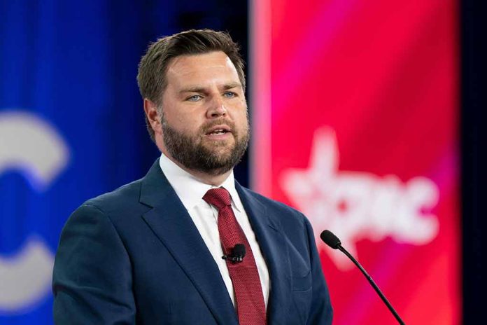 Man in suit speaking at conference podium