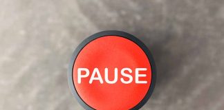 Red button labeled "PAUSE" on gray background.