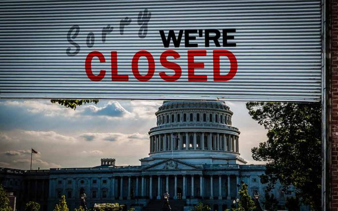 Capitol building with closed sign above entry gate