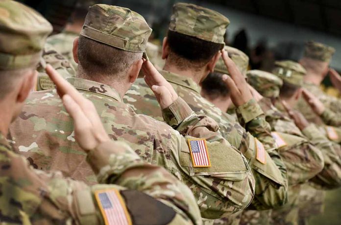 Soldiers in camouflage uniforms saluting in formation outdoors