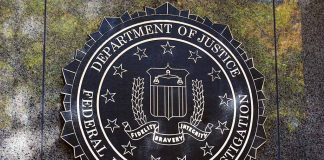 Department of Justice FBI emblem on a wall