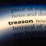 The word "treason" highlighted in a dictionary.