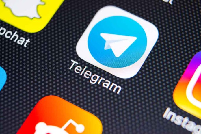 1023930217 featured image Telegram app icon on a smartphone screen
