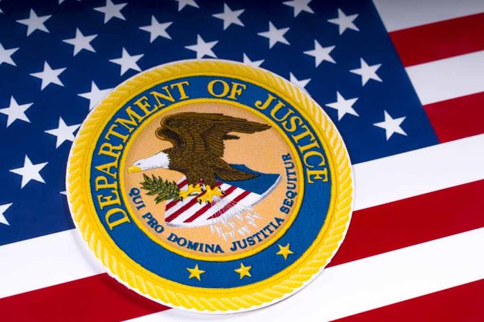 1054857701 featured image Department of Justice emblem on the American flag.