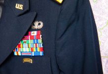 Military jacket with ribbons and badges displayed