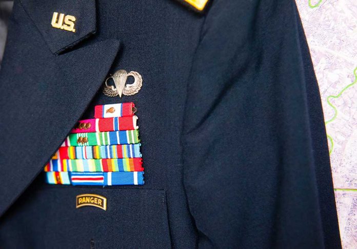 283939994 featured image Military jacket with ribbons and badges displayed