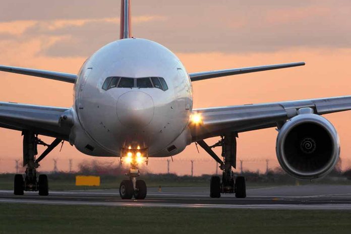 555148006 featured image Airplane on runway during sunset.