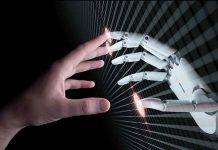 Human and robotic hand reaching out to touch.