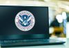 Laptop displaying US Department of Homeland Security logo