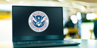 Laptop displaying US Department of Homeland Security logo