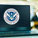 Laptop displaying US Department of Homeland Security logo