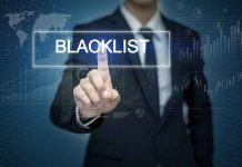 Man pressing virtual blacklist button