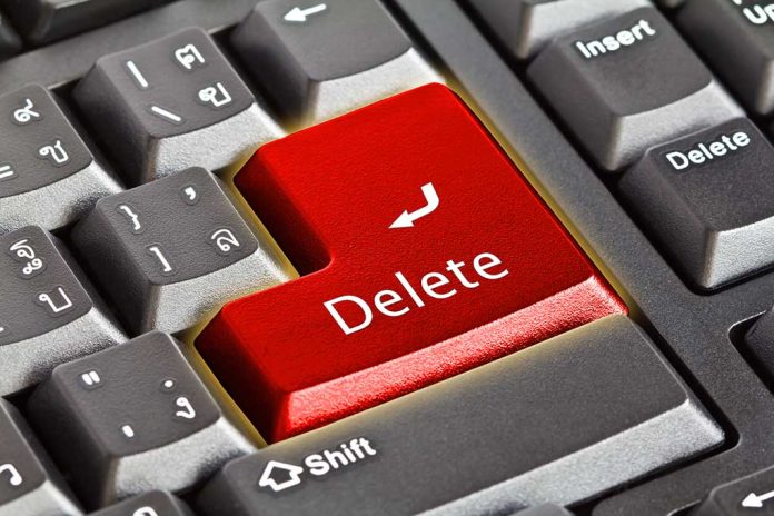 77868673 featured image Closeup of a keyboard with red Delete key