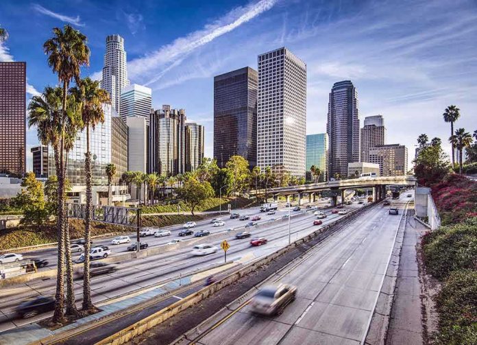 172033643 Downtown cityscape with skyscrapers and highway traffic