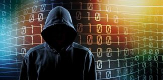 Hooded figure with binary code background