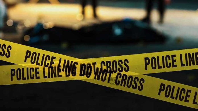 2230640045 Police tape marking a crime scene at night
