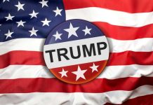 Button with Trump on American flag.