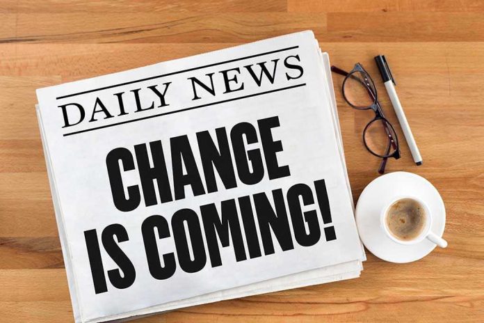 565655122 Newspaper headline Change Is Coming on table