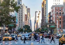 City street with pedestrian crossing and traffic
