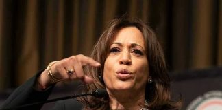 Person speaking passionately at a podium.