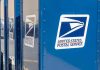 Blue USPS mail collection boxes in a row