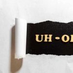 Mamdani’s OWN MOTHER Throws Him Under The BUS! Torn paper revealing UH-OH text underneath.