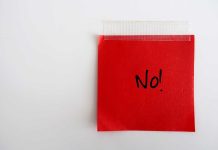 BOMBSHELL — Democrat Senators Deny Pay to Essential Workers! A red sticky note with the word No written in black ink