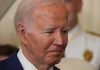Biden’s Autopen Scandal: Constitutional Crisis Looms Man in a suit looking thoughtful.