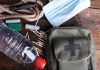 Aid Mission Goes HORRIBLY Wrong — Shocking Video An assortment of emergency supplies including a first aid kit, water bottle, face mask, and matches