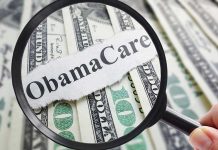 Magnifying glass over Obamacare text and money