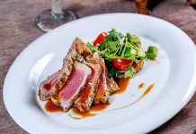 Portion Sizes Shrink As A New Market Takes Hold Plated seared tuna with a fresh salad on the side