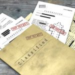 Congressman Drops Epstein Names—Proof Missing Classified documents with Top Secret stamps on wooden surface.