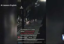 Cubans Torch Communist HQ