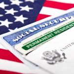 Social Security card and Permanent Resident card on an American flag background