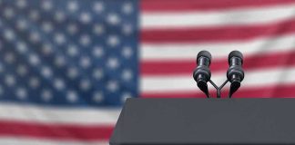 Trump’s Ultimatum to Iran – Deal or Doom? Podium with microphones in front of American flag.