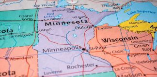 Stolen Land Clash: Wisconsin On Edge! Map highlighting Minnesota, North Dakota, South Dakota, Wisconsin.