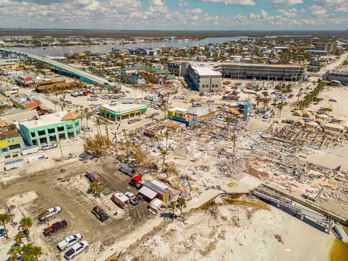 2208987255-1 Aerial view of hurricane-damaged buildings and debris.