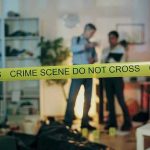 Subway Stabbings Surge—Are Riders Safe? Crime scene with tape and investigators examining evidence.