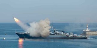 Iran Missiles Stop Cold — Then Payback Warship firing missile in the sea.