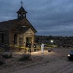 Cartel Cannibal Rituals: Horror Story Raises Alarms Police and forensic team at a crime scene near an abandoned church in the desert