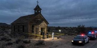 Cartel Cannibal Rituals: Horror Story Raises Alarms Police and forensic team at a crime scene near an abandoned church in the desert