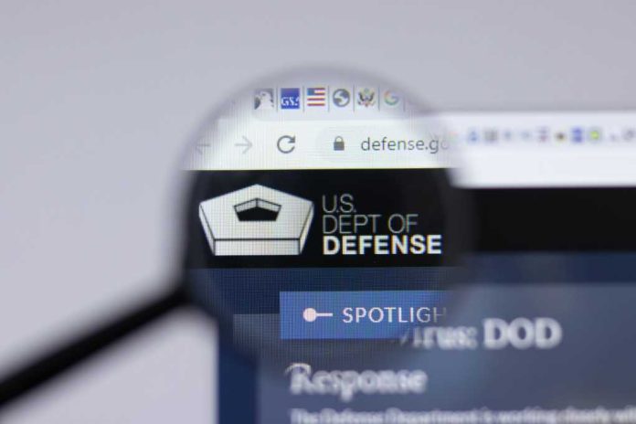 us-dept-of-defense-logo-close-up-on-website-page1963403443jpg Magnifying glass focusing on US Department of Defense website