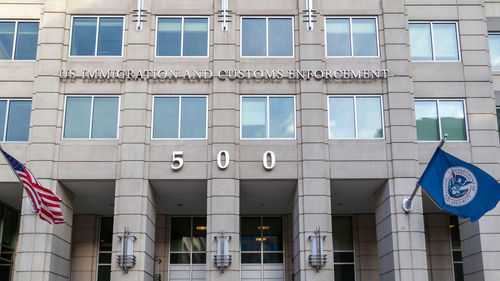 us-immigration-and-customs-enforcement-ice1664969152 US Immigration and Customs Enforcement building entrance flags