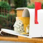 NYC Welfare Wave Hits 30-Year High White mailbox with cash and envelopes spilling out