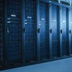 New York Slams Brakes On AI Centers Row of server racks in a data center