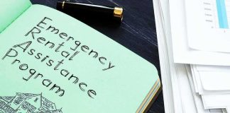 Judge Hands DSA Millions — Family Stunned Notebook titled Emergency Rental Assistance Program beside papers and pen